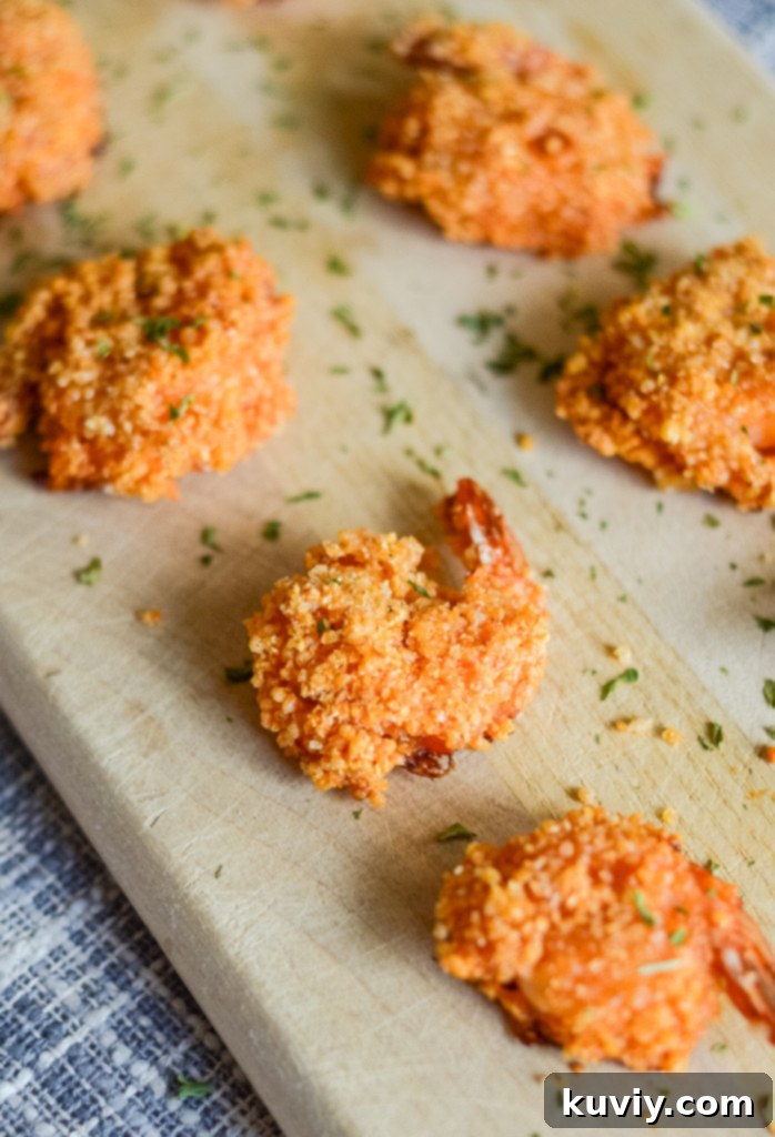 Platter of air fryer buffalo shrimp with celery and ranch dressing