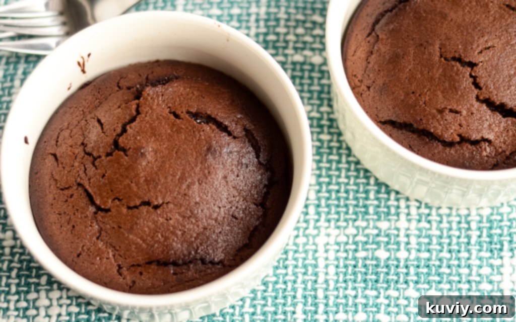 Decadent Air Fryer Chocolate Lava Cakes (Gluten-Free Option) 7 Air Fryer Lava Cakes baking in ramekins