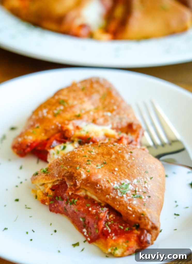 Delicious golden-brown air fryer pizza ring on a cutting board, ready to be served.