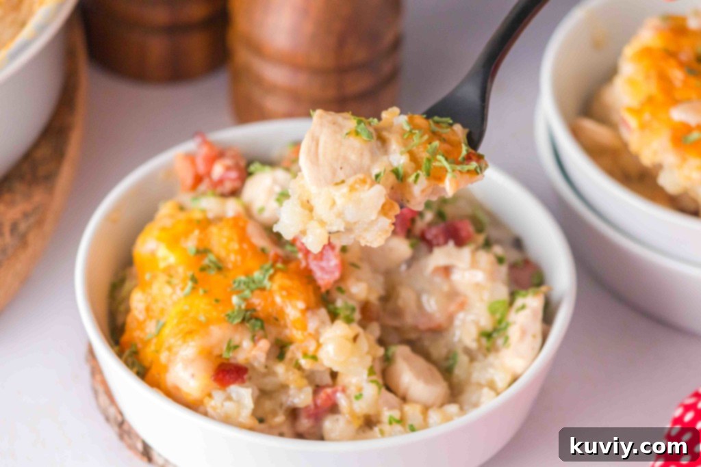 Air Fryer Chicken Bacon Ranch Casserole served alongside a fresh green salad