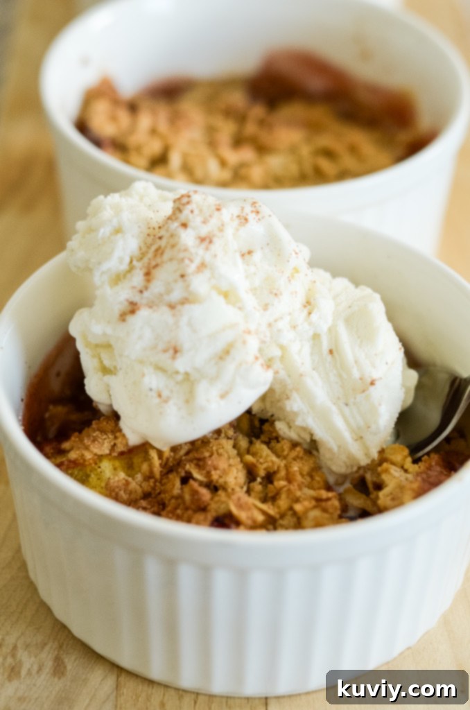 air fryer peach crisp served with ice cream