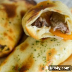 Air Fryer Philly Cheesesteak Egg Rolls on a serving plate