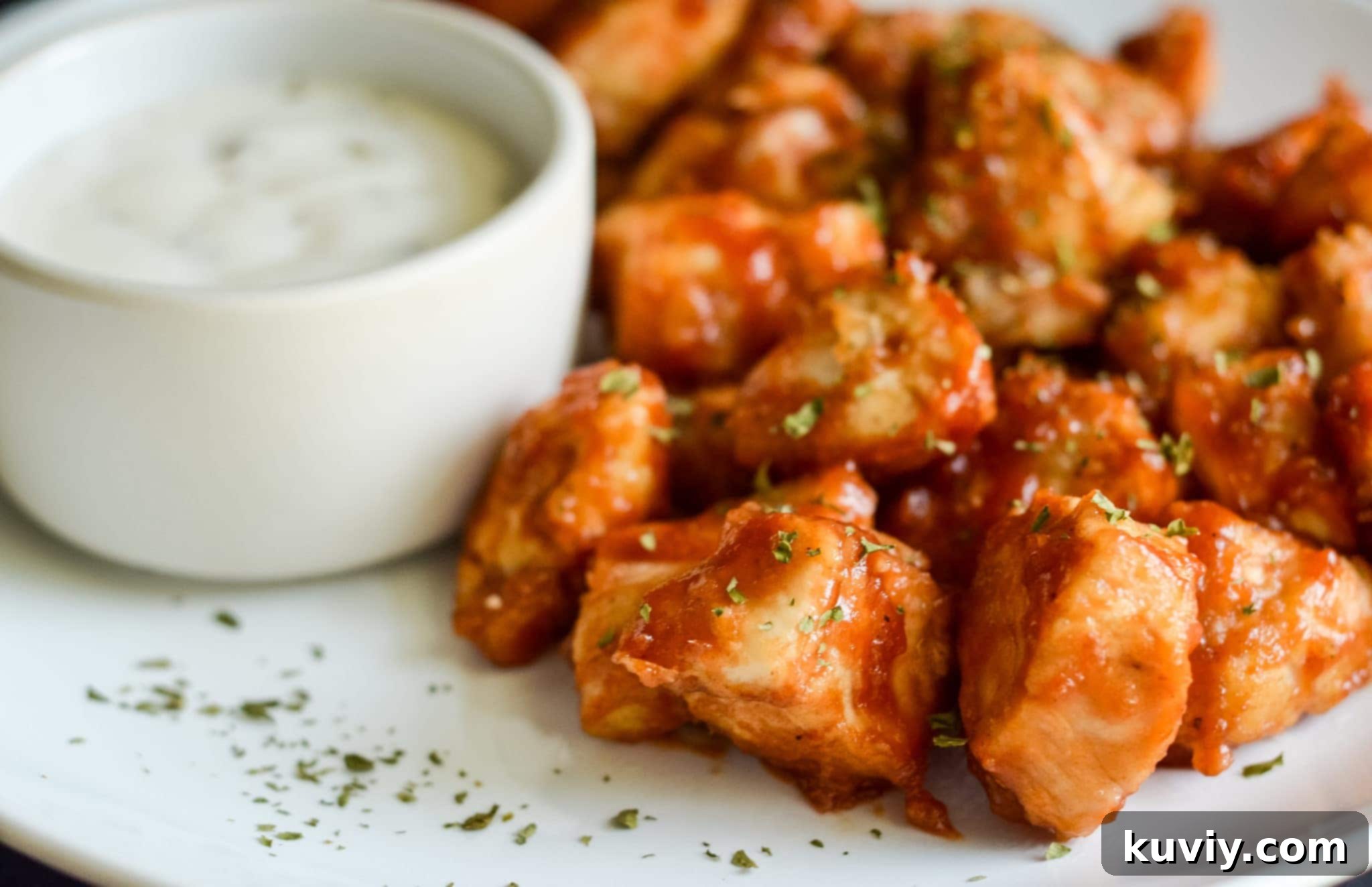 Sauced Air Fryer Barbecue Chicken Nuggets in the air fryer basket.