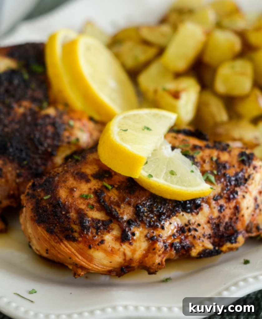 The image shows plated air fryer lemon pepper chicken.