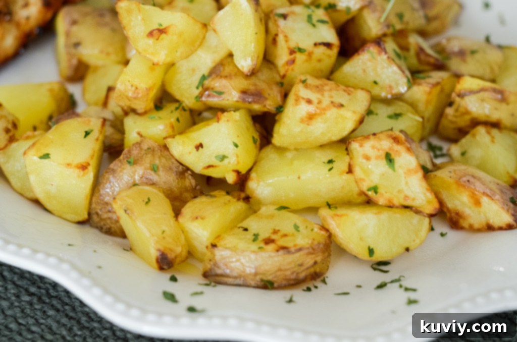 air fryer yellow potatoes garnished with dried parsley