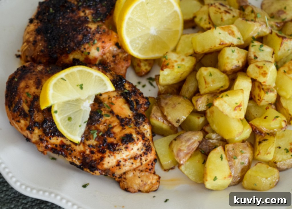air fryer yellow potatoes plated with air fryer lemon pepper chicken