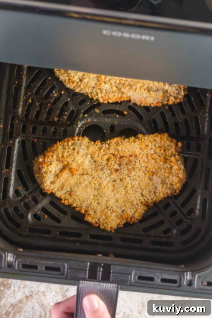 Crispy Air Fryer Chicken Schnitzel 4 Gluten-free Air Fryer Chicken Schnitzel ingredients being prepared