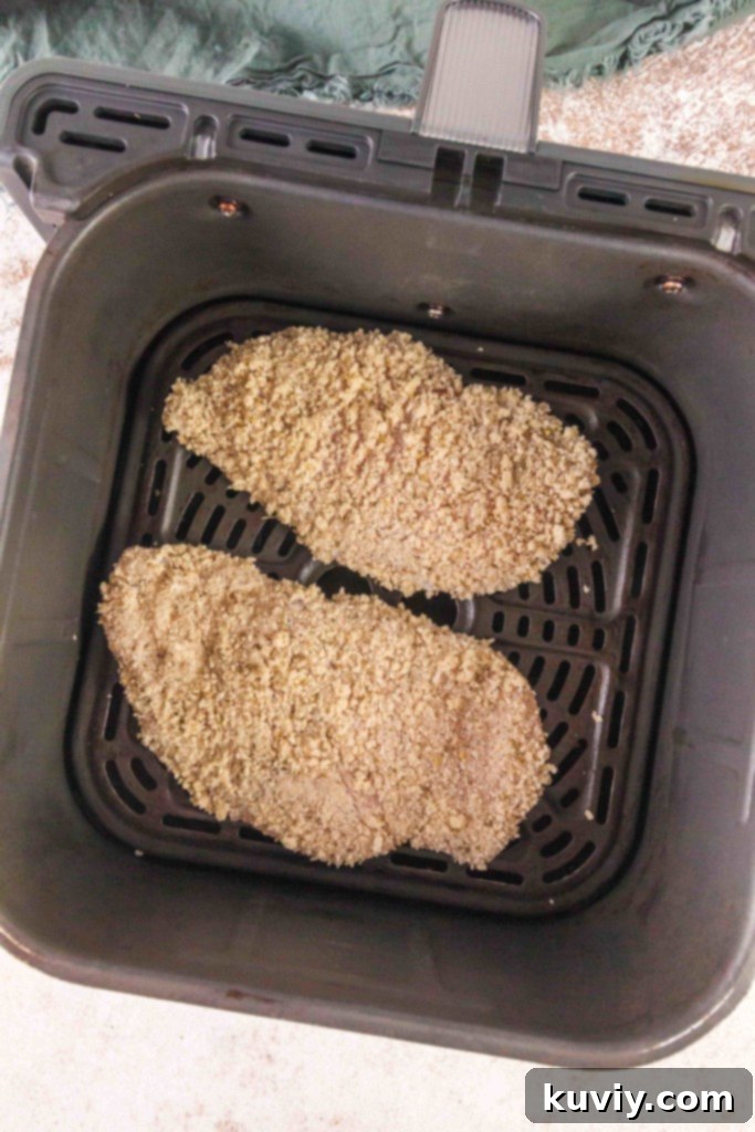 Crispy Air Fryer Chicken Schnitzel 6 Four pieces of Air Fryer Chicken Schnitzel ready to serve