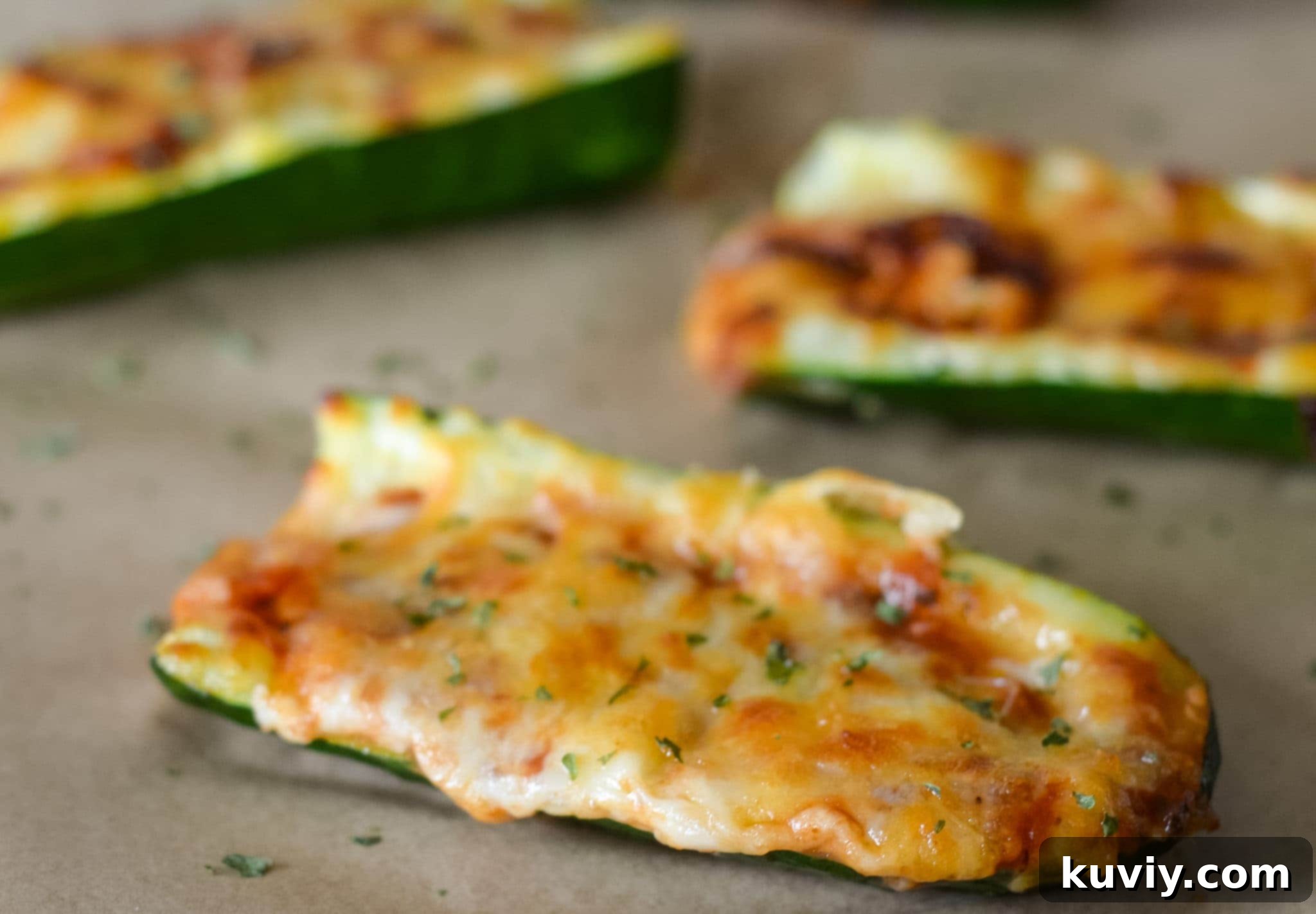 Variety of toppings on Air Fryer Zucchini Pizza Boats