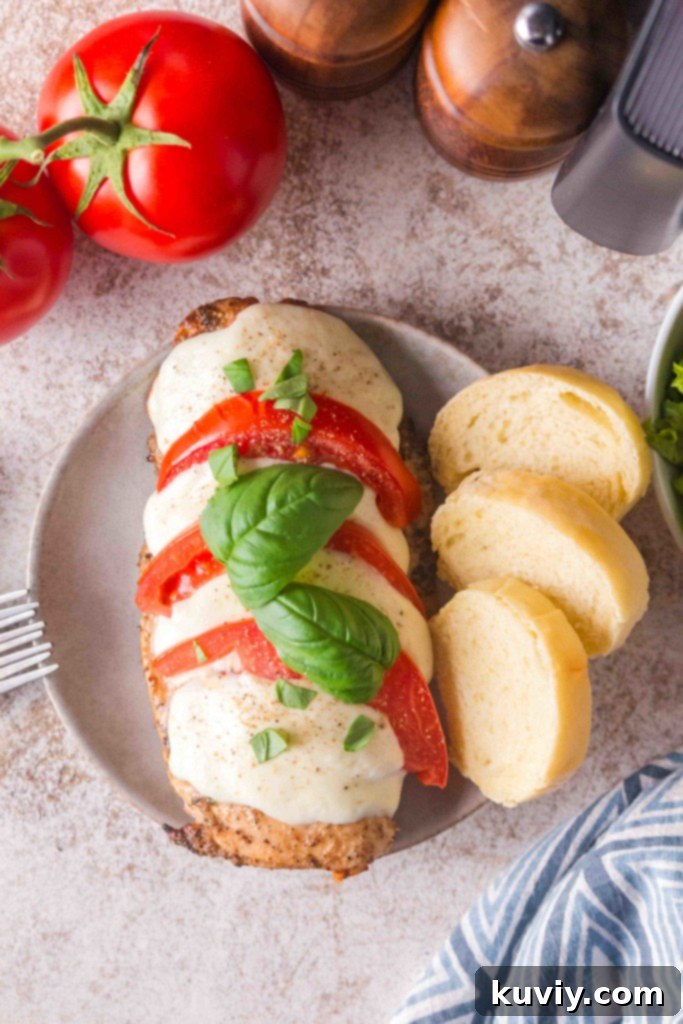 Gluten-Free Air Fryer Caprese Chicken with fresh tomatoes, mozzarella, and basil