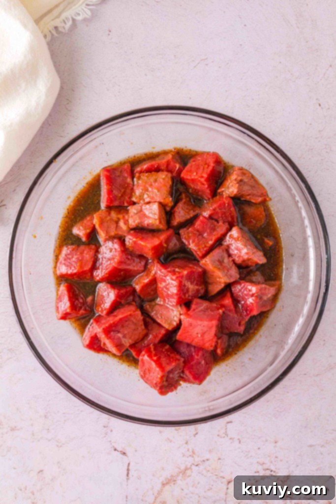 The Ultimate Sweet and Savory Air Fryer Orange Beef Skewers 5 air fryer orange beef skewers in marinade