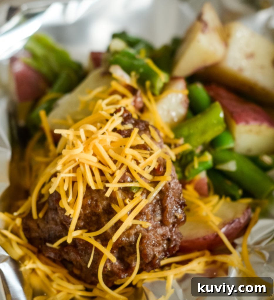 Air fryer basket lined with foil and ingredients, showing proper placement