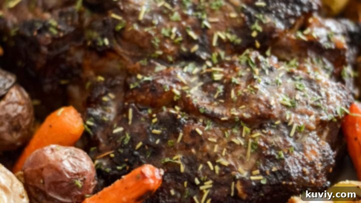 Perfectly cooked Air Fryer Beef Roast, sliced and ready to serve.