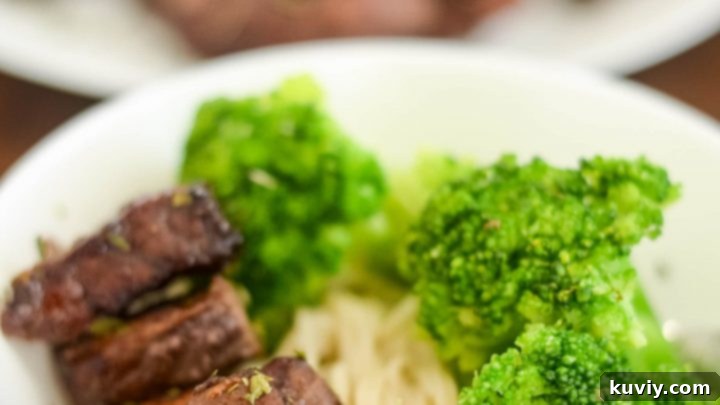 Tender and juicy Easy Air Fryer Beef Tips, served with gravy.