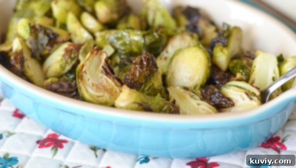 A small carrot cake with frosting, baked perfectly in an air fryer, ideal for Easter dessert.