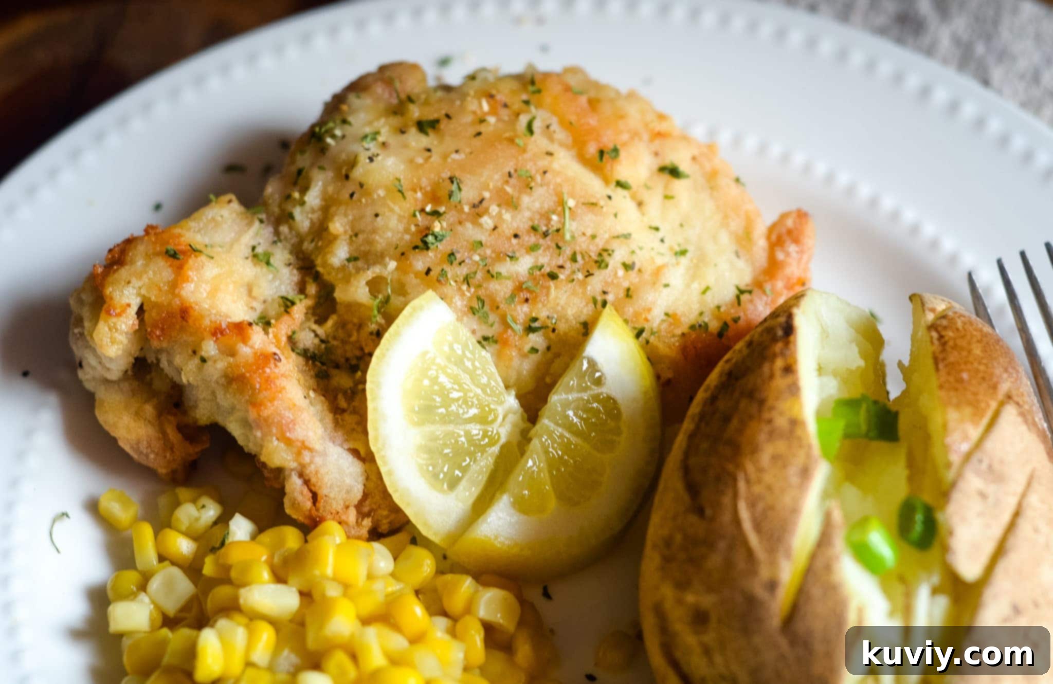 Air Fryer Lemon Pepper Fried Chicken – uncooked chicken thighs in seasoning