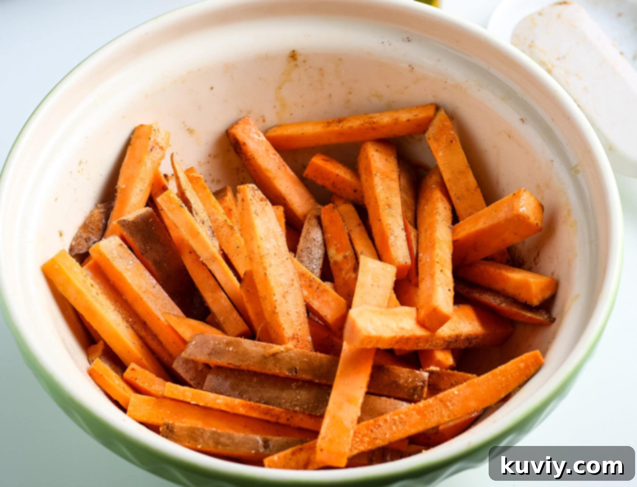 Preparing sweet potato fries for air fryer