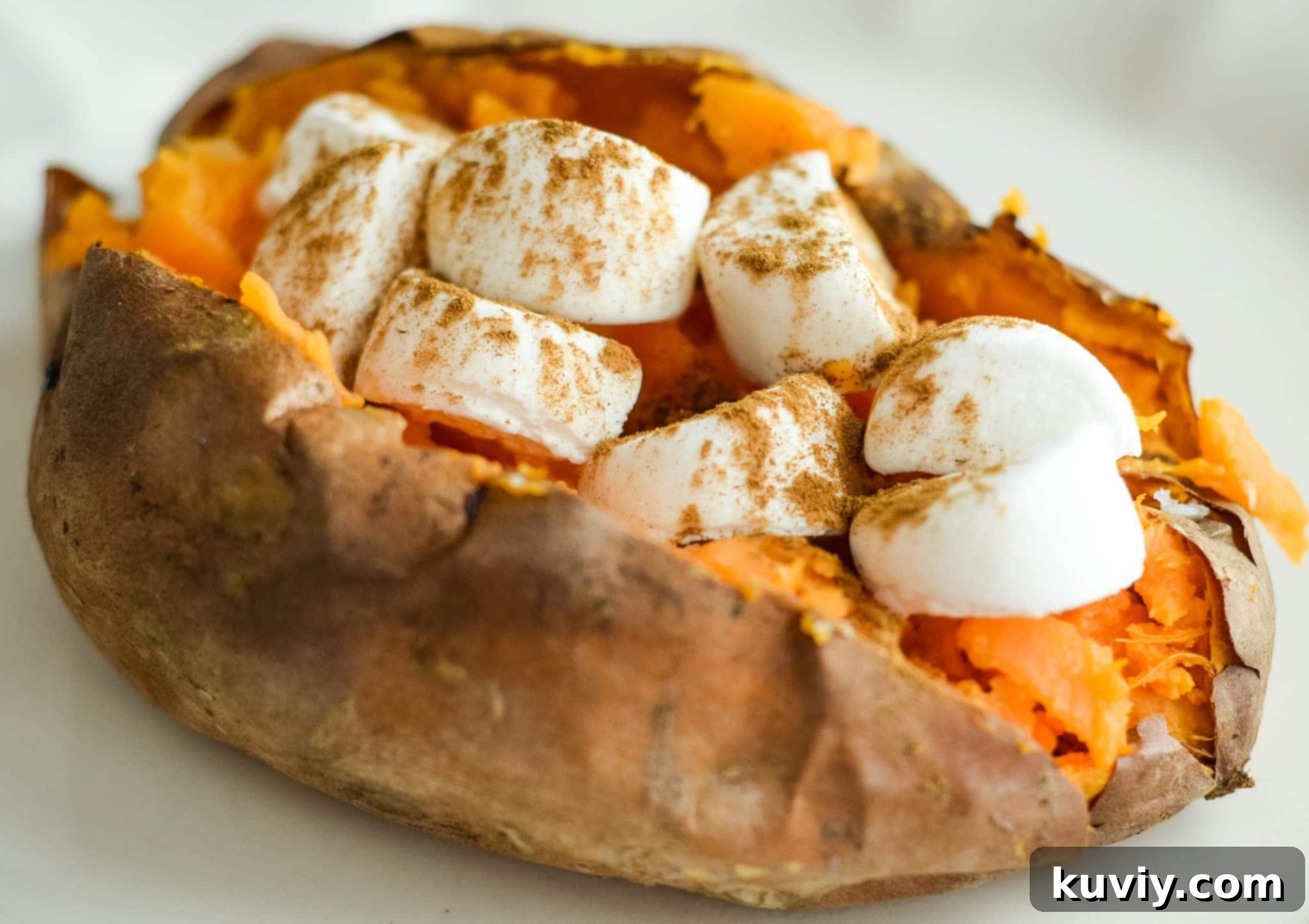 Ingredients for air fryer sweet potatoes, including butter and cinnamon