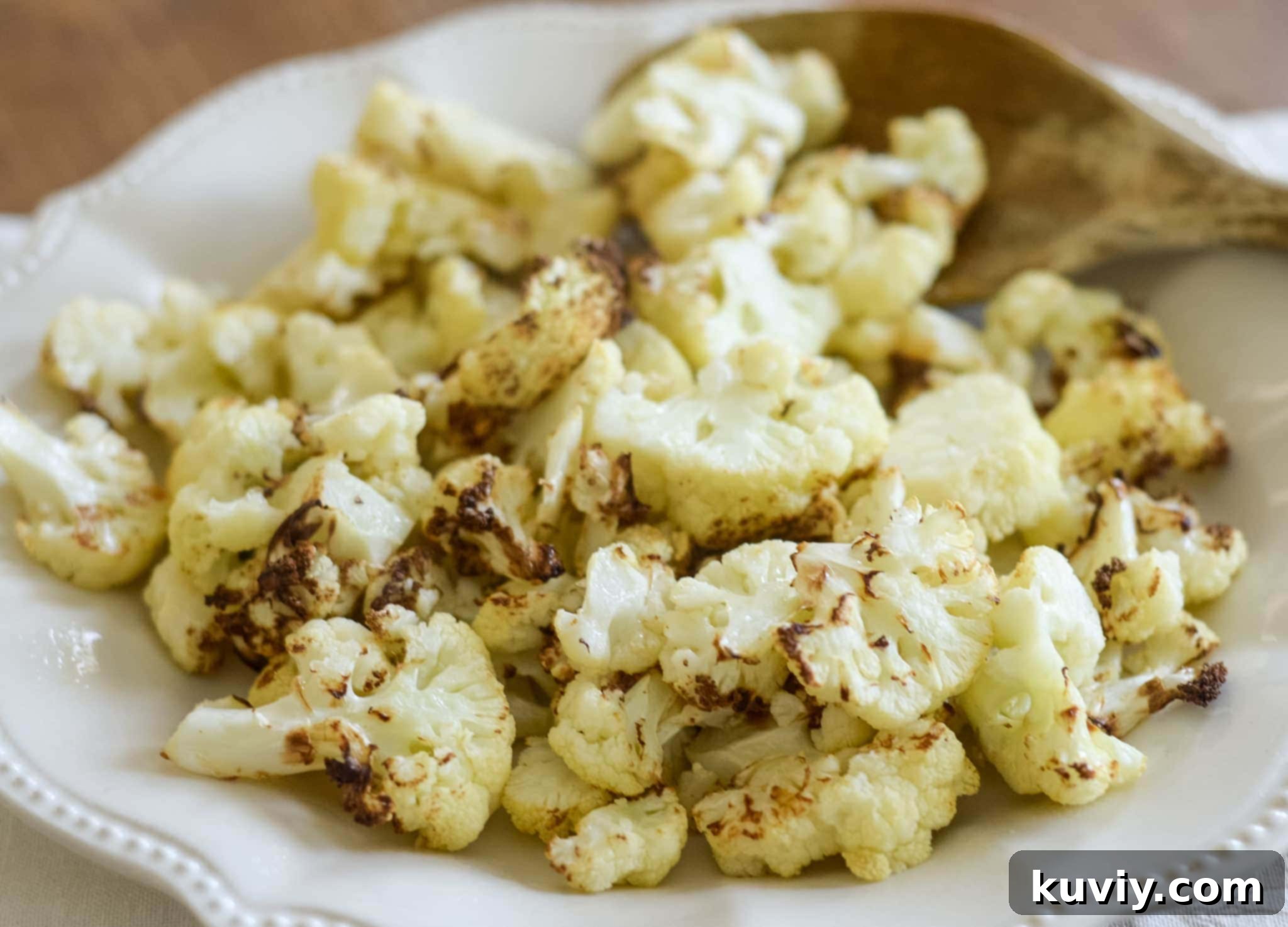 Close-up of roasted cauliflower florets in air fryer