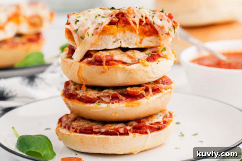 Air Fryer Pizza Bagels sizzling and melting in the air fryer basket