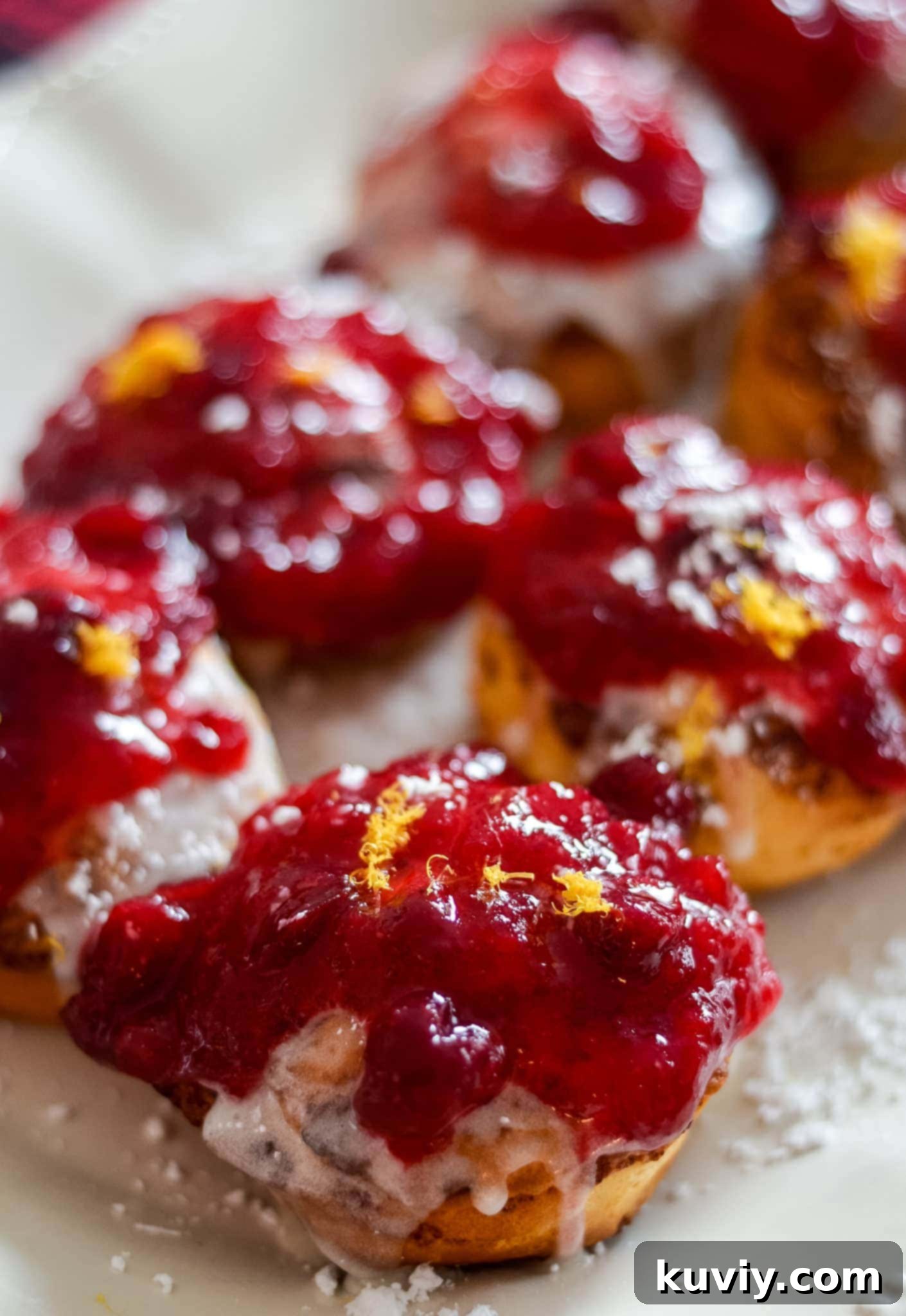 Air Fryer Cranberry Cinnamon Swirls with Zesty Glaze 2 Air Fryer Cranberry Glazed Cinnamon Rolls – A perfect blend of sweet and tart for a quick breakfast or dessert.