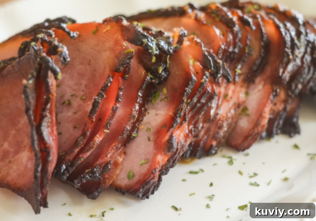 Air Fryer Brown Sugar Glazed Ham 5 air fryer ham with a golden crust, ready to serve