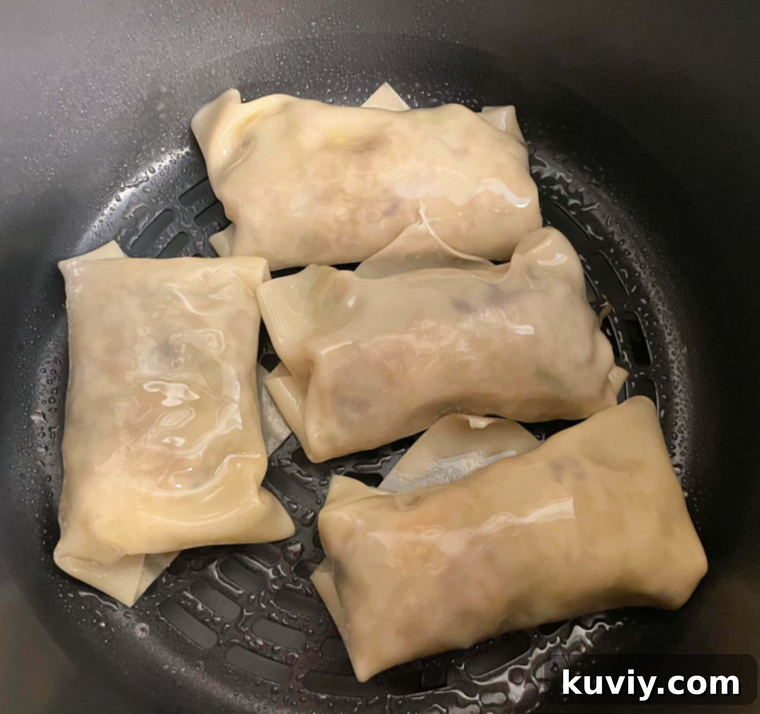 Ninja Foodi Air Fryer Egg Rolls 3 Stack of air fryer egg roll wraps