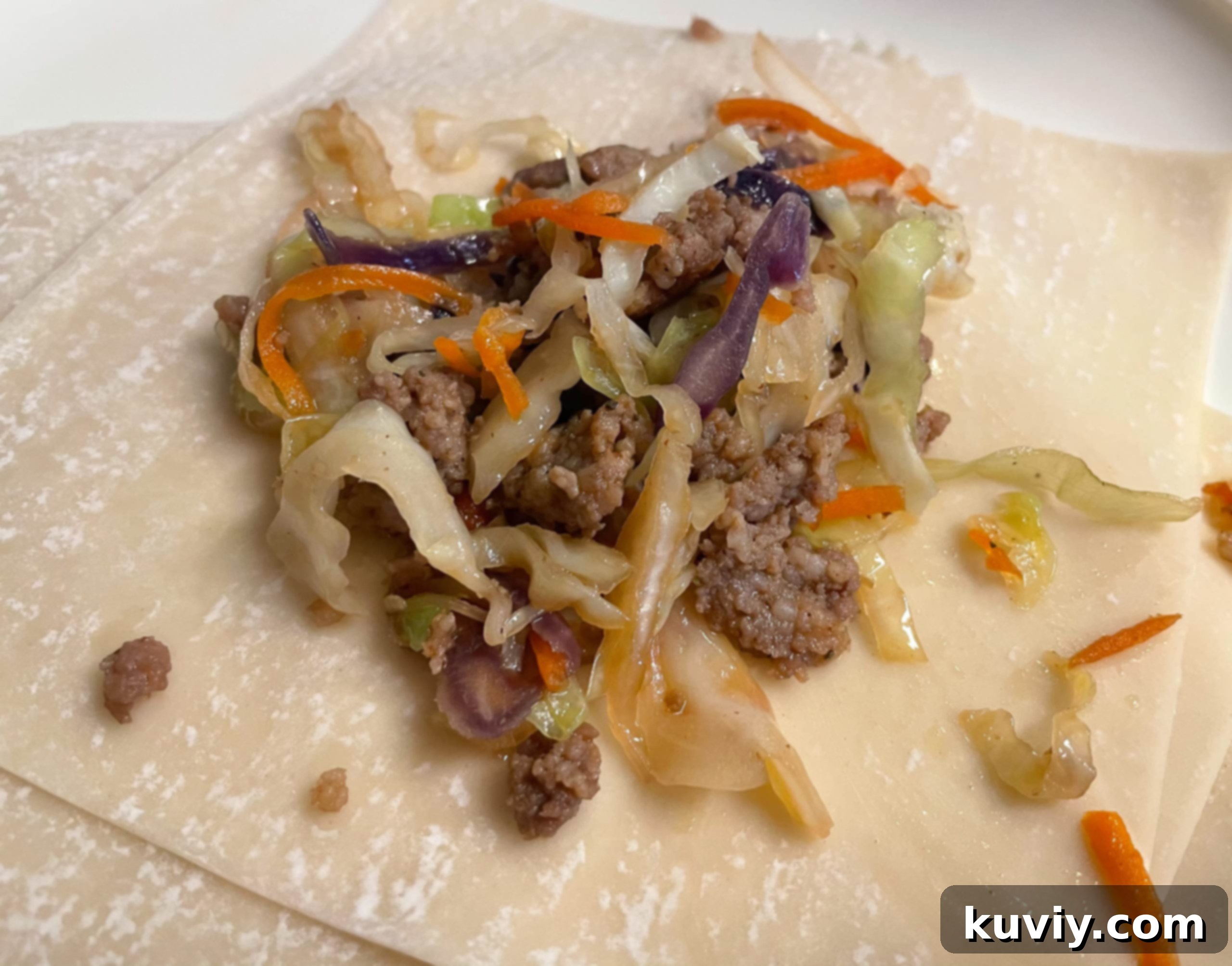 Ninja Foodi Air Fryer Egg Rolls 4 Air fryer egg roll wraps being prepared