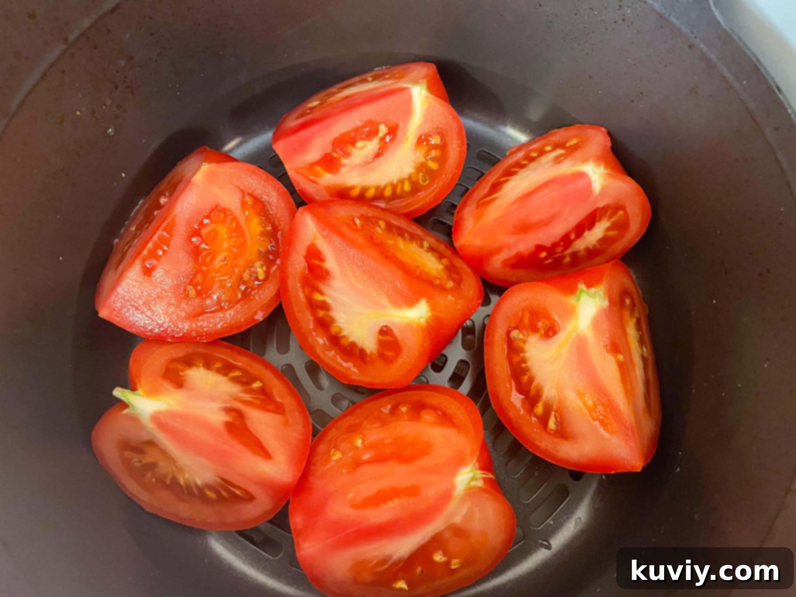air fryer roasted tomatoes in basket