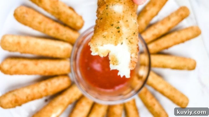Air Fryer Frozen Mozzarella Sticks, golden and melted
