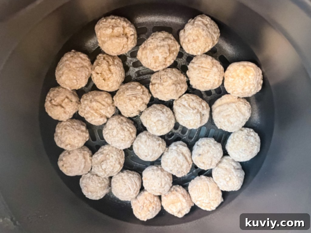 Effortless Air Fryer Frozen Meatballs 3 Air Fryer Basket with Frozen Meatballs