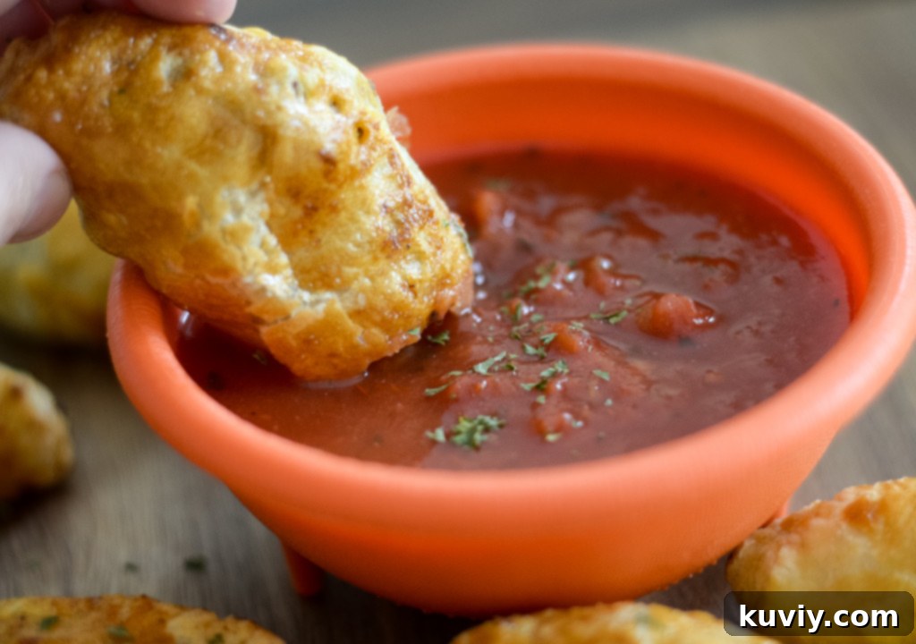 Golden brown air fryer empanadas fresh out of the air fryer