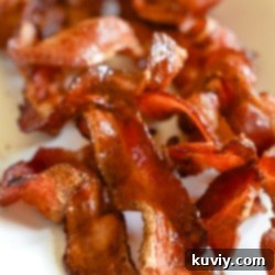Crispy bacon strips perfectly cooked in an air fryer