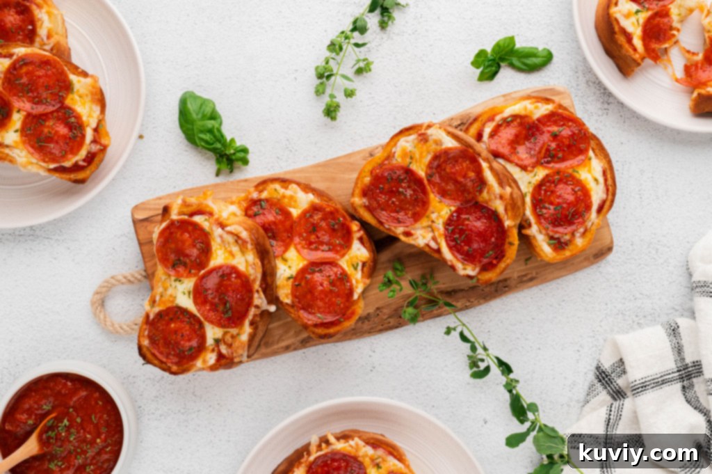 Close-up of golden-brown Air Fryer Garlic Bread Pizza Toast ready to serve