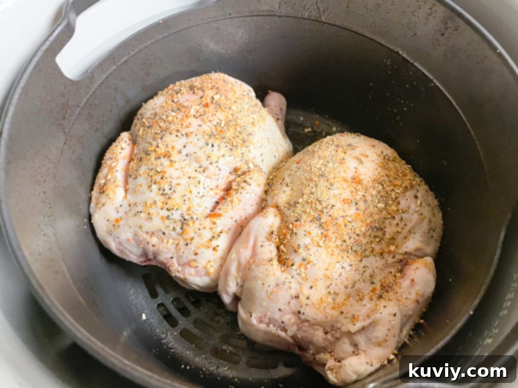 air fryer cornish hens cooking in air fryer basket