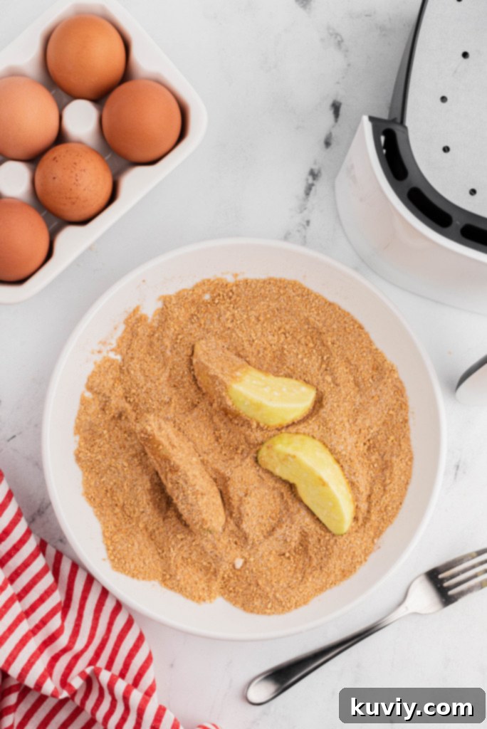 sliced Granny Smith apple wedges prepared for air frying
