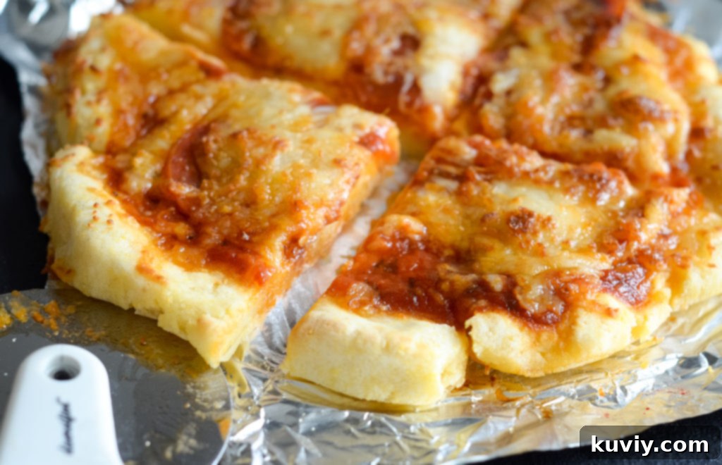 Crispy Gluten-Free Air Fryer Pizzas 5 Fresh ingredients laid out for making Air Fryer Pan Pizzas: dough, sauce, cheese, and pepperoni.