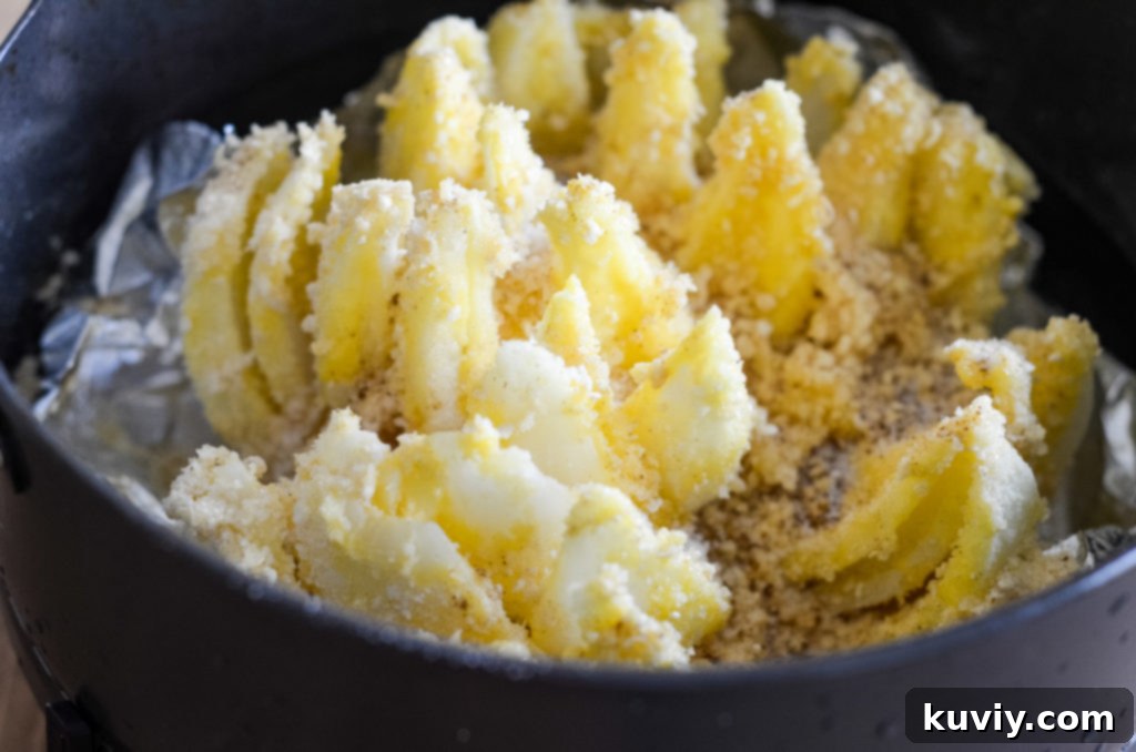 Step-by-step image of a blooming onion after being cut and separated into petals.
