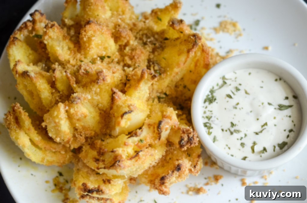 Air fried blooming onion after cooking, golden and crispy.
