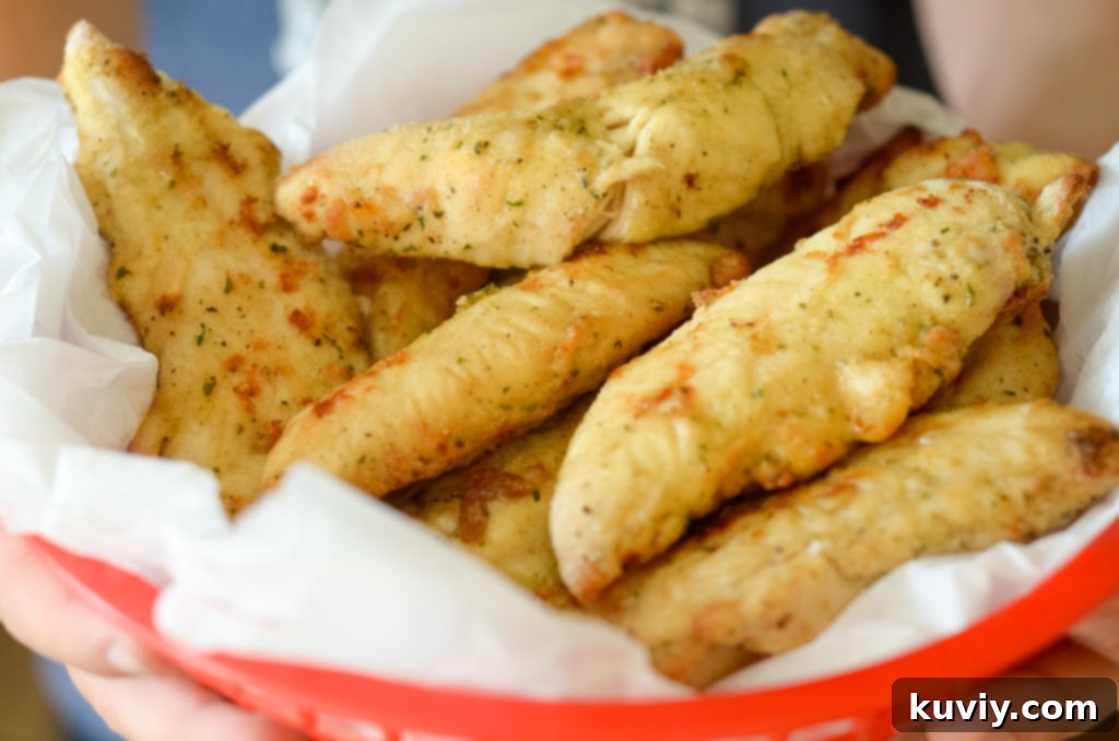 Crispy Air Fryer Ranch Chicken Tenders 2 air fryer ranch breaded chicken tenders in basket