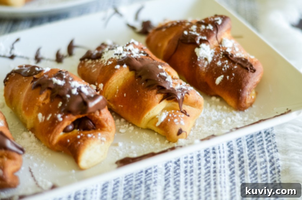A basket of freshly cooked Air Fryer S'mores Crescent Rolls.