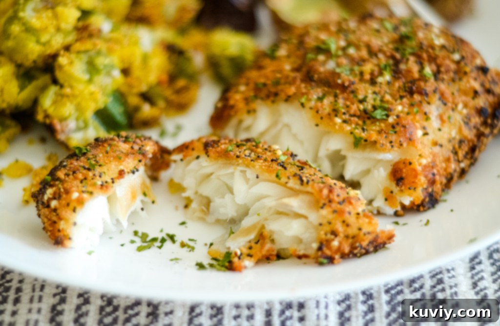 Close-up of a stack of air fryer cooked frozen cod fillets, ready to be served