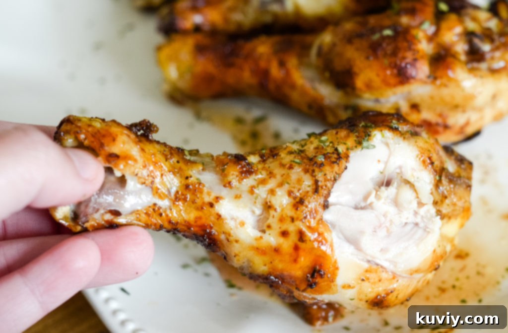 Perfectly Crispy Air Fryer Drumsticks 5 air fryer chicken drumsticks served on a plate