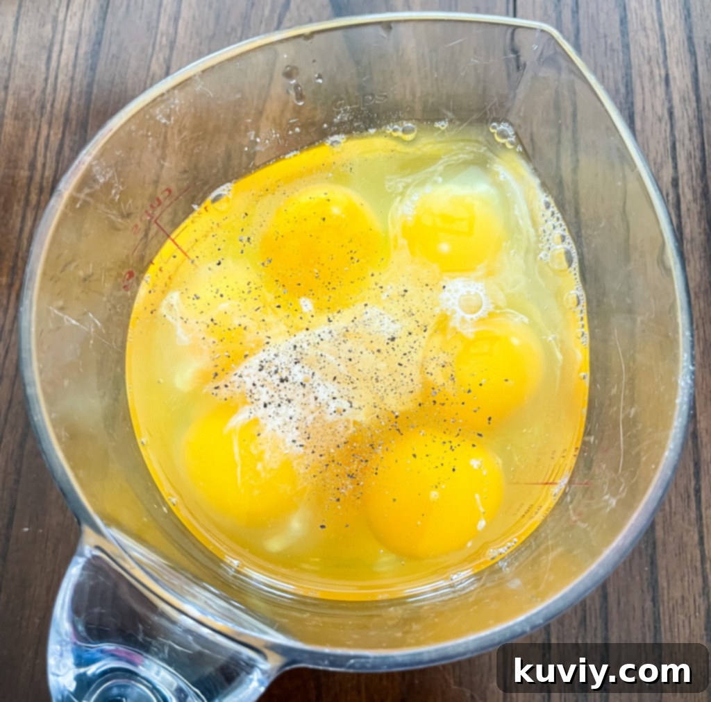fluffy air fryer scrambled eggs served on a plate