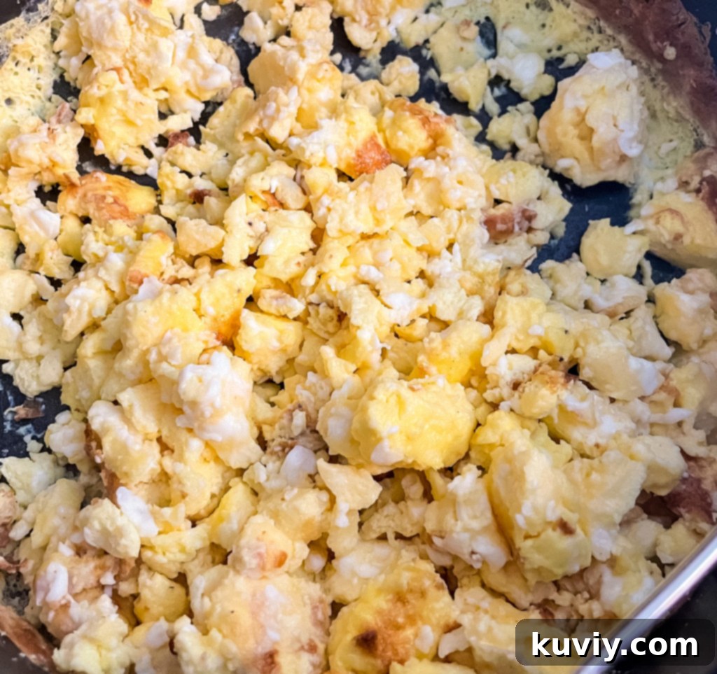 air fryer scrambled eggs mixture in a bowl