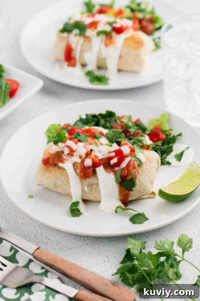 Air fryer beef and bean chimichangas being prepared in a Ninja Foodi