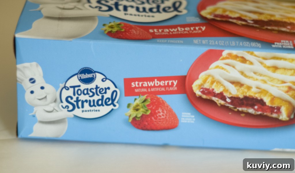 Air Fryer Toaster Strudel Hack 4 Air fryer basket lined with parchment paper, ready for Toaster Strudels to prevent sticking.