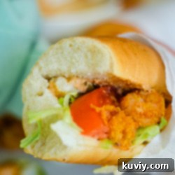 Crispy Air Fryer Shrimp Po'Boy 7 Air Fryer Shrimp Po' Boy on a wooden board