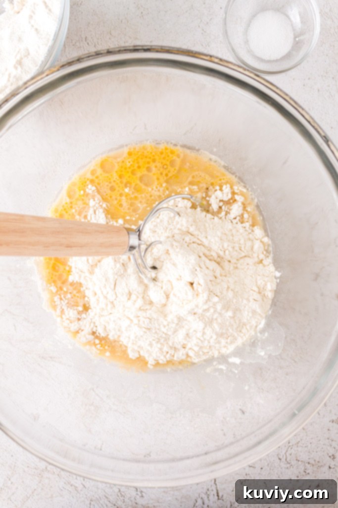 Air fryer dinner roll dough being prepared with simple ingredients