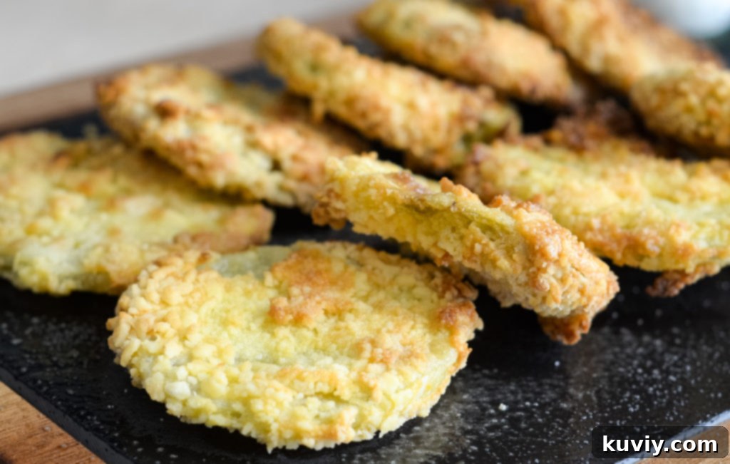 Air Fryer Fried Green Tomatoes with oil spray for crisping